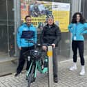 Making cycling e-asier beneficiary sits on his free one-month TIER e-cycle loan. Image submitted.
