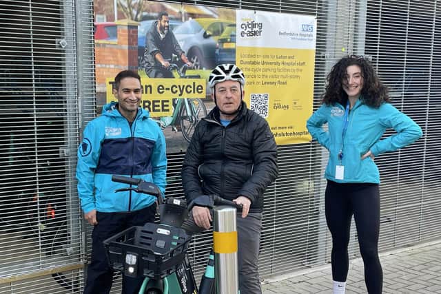 Making cycling e-asier beneficiary sits on his free one-month TIER e-cycle loan. Image submitted.