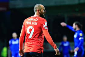 Luton forward Danny Hylton has left the club to join Northampton Town