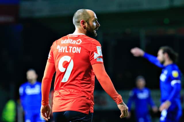 Luton forward Danny Hylton has left the club to join Northampton Town