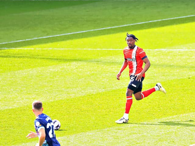 Teden Mengi brings the ball out of defence against Brentford - pic: Liam Smith