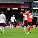 Jordan Clark celebrates scoring against Manchester City in the FA Cup earlier this season - pic: Liam Smith