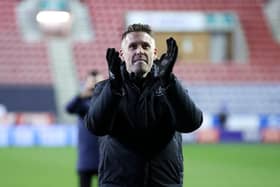 Town manager Rob Edwards applauds the Luton supporters after Tuesday night's FA Cup win