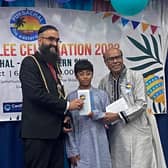 Cllr Mohammed Yaqub Hanif with Isaam Ibrahim Zaman aged 12