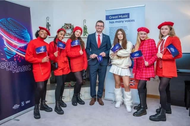The UK team met British ambassador John  Gallagher in Yerevan, pictured here with last year's winner in cream - Malena from Armenia.