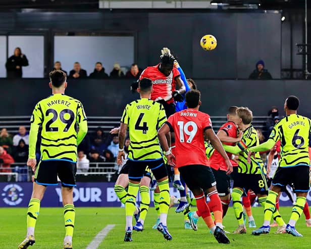 Elijah Adebayo gets up to make it 2-2 against Arsenal this evening - pic: Liam Smith