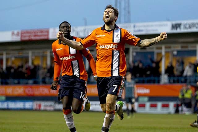Alex Lawless celebrates scoring the FA Cup third round winner against Wolves in January 2013