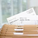 Home filing dividers for council tax & household bills. Photo: AdobeStock