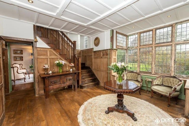 The home offers spacious early 20th Century grandeur