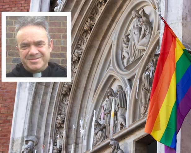 Rev. Canon David Kesterton (inset), with a pride flag outside a church. Picture: David Kesterton and ALEX HALADA/AFP via Getty Images