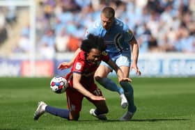 Tahith Chong is fouled by Jake Bidwell during Birmingham City's clash with Coventry City last season - pic: Matthew Lewis/Getty Images