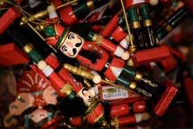 Decorative wooden soldiers are seen among some other festive items (Photo by Leon Neal/Getty Images)
