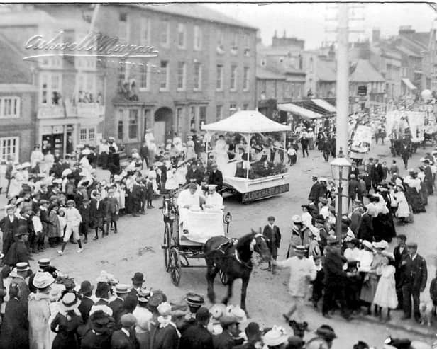 An Empire Day procession in High Street North. Picture from the Trevor Hunt collection.