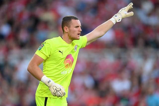 Luton have signed Barnsley keeper Jack Walton for an undisclosed fee