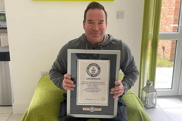 Mark posing with his certificate. Picture: Mark O'Brien