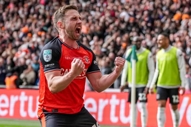 Jordan Clark celebrates the Hatters' third goal against Stockport on Sunday - pic: David Horn / PRiME Media Images
