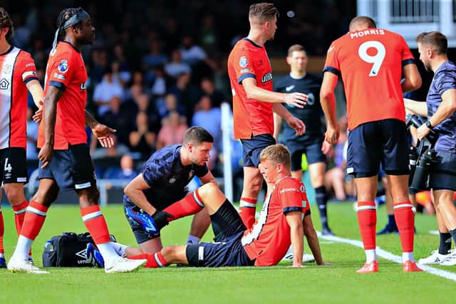 Mads Andersen receives treatment against Tottenham Hotspur - pic: Liam Smith