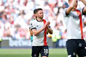 Hatters midfielder Jordan Clark applauds the Luton fans after relegation was all but confirmed at West Ham - pic: Liam Smith