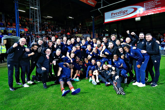 The Luton players celebrate reaching Wembley at the end of the night