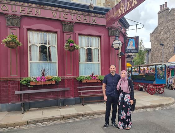 Bereaved parents Khuram Liaquat and Yasmin Stannard outside the Queen Victoria pub in EastEnders