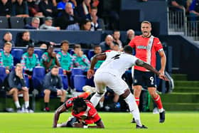 Elijah Adebayo is fouled by Kurt Zouma during Luton's 2-1 defeat to West Ham - pic: Liam Smith