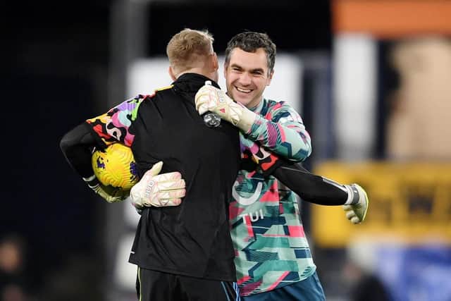 Town stopper James Shea embraces Arsenal keeper Aaron Ramsdale last season - pic: David Price/Arsenal FC via Getty Images