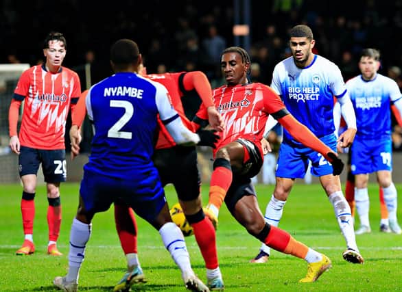 Amari'i Bell drives forward during yesterday's 1-1 draw against Wigan