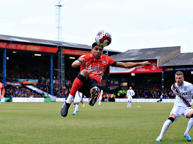 Cody Drameh goes for a spectacular clearance against Stoke on Saturday