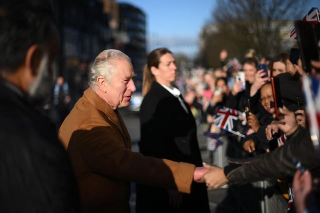 Britain's King Charles III greets members of the public as he visits Luton Town Hall. (Photo by Daniel LEAL / POOL / AFP) (Photo by DANIEL LEAL/POOL/AFP via Getty Images)