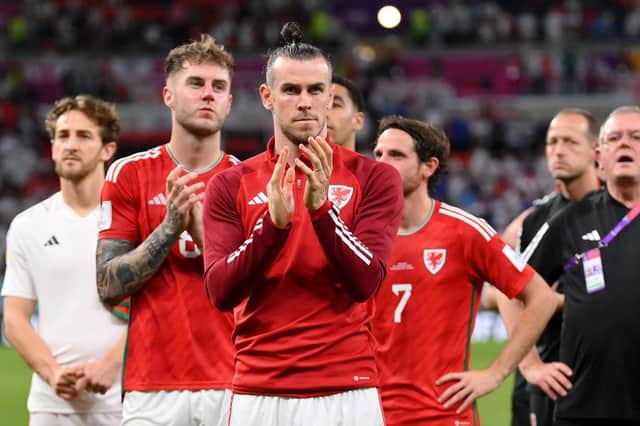 Tom Lockyer applauds the Wales fans along with Gareth Bale after their exit from the World Cup last night