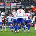 George Saville heads home for the Hatters against Reading on Saturday - pic: Andy Fitzsimons