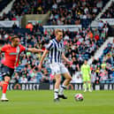 Carlton Morris looks to apply the pressure for Luton during their 5-3 defeat against West Bromwich Albion - pic: Liam Smith