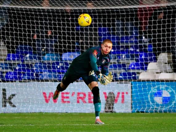 Ethan Horvath throws the ball out during Luton's FA Cup tie with Wigan on Saturday