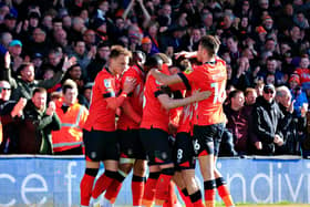 Luton's players celebrate Carlton Morris making it 2-1 to the Hatters