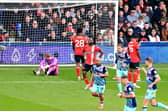 Luton's players react to falling 2-0 behind against Brentford - pic: Liam Smith