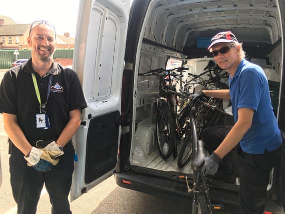 PC Scott Pattie and Bike Recycling Officer Chris Wilkinson.