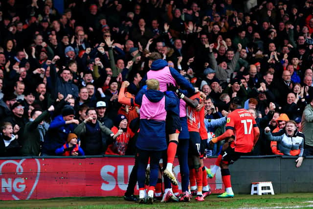 Luton's players rejoice at Allan Campbell making it 2-0 on Saturday