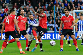 Amari'i Bell comes under pressure against Huddersfield