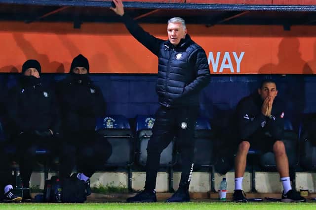 Bristol City boss Nigel Pearson watches on against Luton