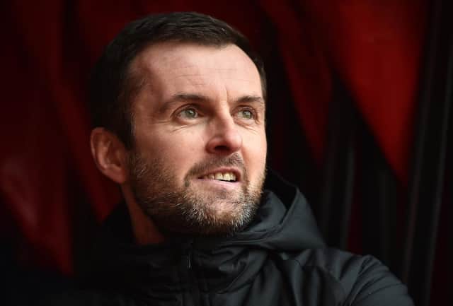 Nathan Jones, manager of Luton Town looks on prior to the Sky Bet Championship match between Stoke City and Luton Town at Bet365 Stadium on February 20, 2021.