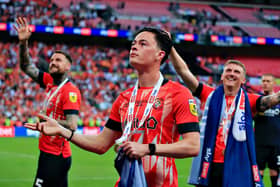 Town midfielder Louie Watson celebrates promotion with the Hatters at Wembley - pic: Liam Smith