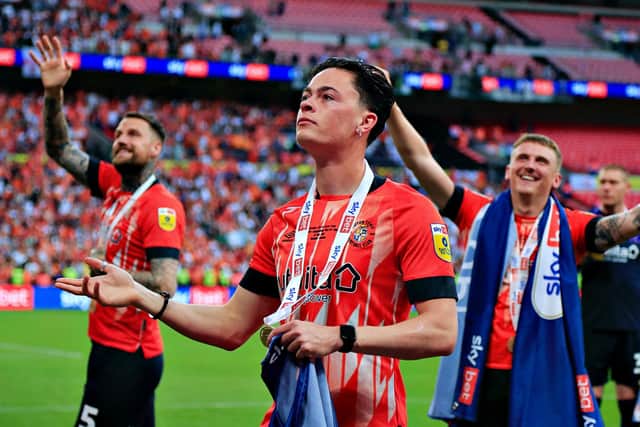 Town midfielder Louie Watson celebrates promotion with the Hatters at Wembley - pic: Liam Smith