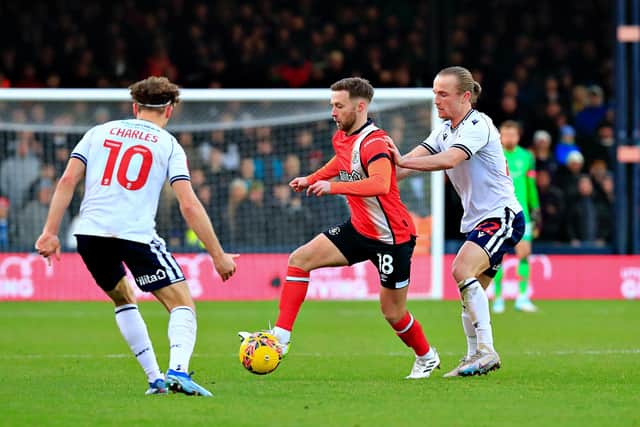 Hatters midfielder Jordan Clark on the ball against Bolton Wanderers - pic: Liam Smith