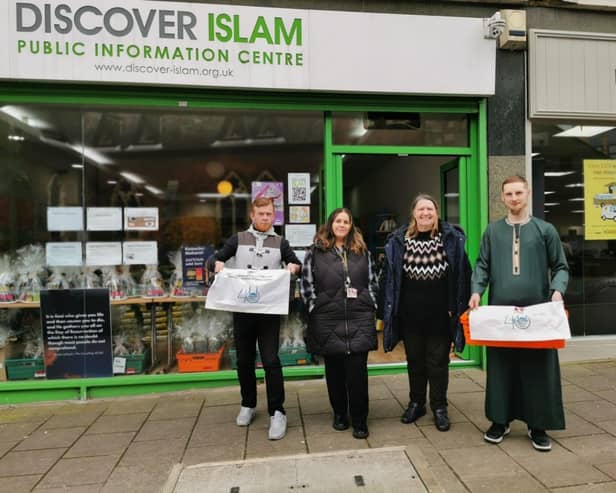 Happy smiles outside Discover Islam after news of support for the Luton Foodbank from the Embassy of Qatar and Islamic Relief UK