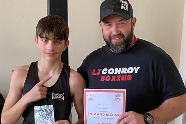 Liam Conroy of Dunstable's Ringcraft boxing club with protege Ajay - one of the club's most dedicated young fighters who became Home Counties champion only two years after starting the sport