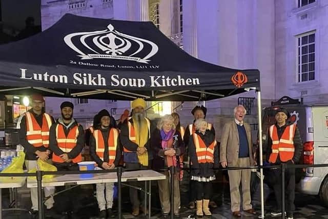 High Sheriff Lady Jane Clifford (in purple scarf) celebrates Bandi Chhor Divas at the Luton Sikh soup kitchen