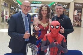 Jenna and Josh dressed as superheroes to raise money for Keech Hospice. They were joined by Roy Greening from The Mall and JP Smith from Boxing Saves Lives