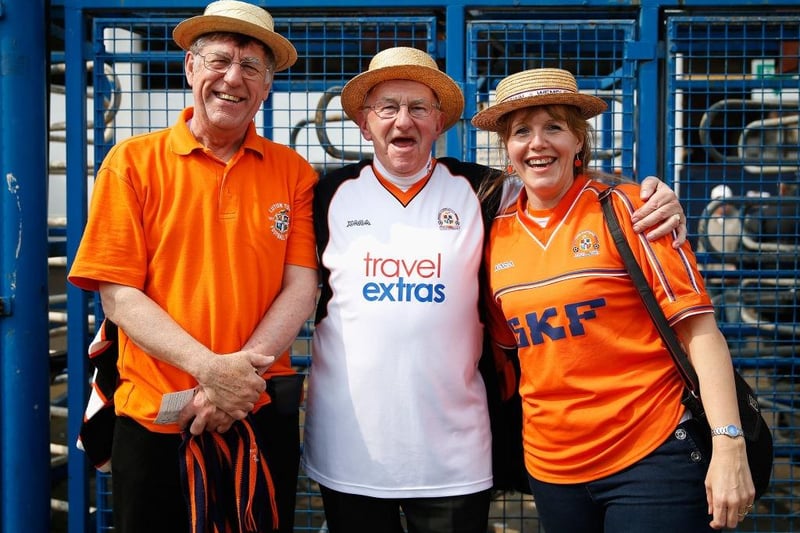 Luton Town supporters pose for a photograph prior to the Skrill Conference Premier match between Luton Town and Forest Green at Kenilworth Road on April 21, 2014.