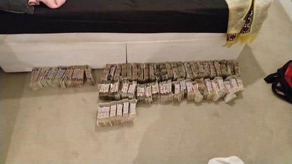 Cash shared between the drug gang. Picture: ERSOU