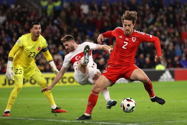 Tom Lockyer wins the ball from Ismail Yuksek during Wales' 1-1 draw with Turkey on Tuesday night- pic: Michael Steele/Getty Images